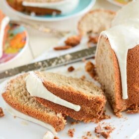 Sliced Sliced Spiced Buttermilk Pound Cake on white cutting board