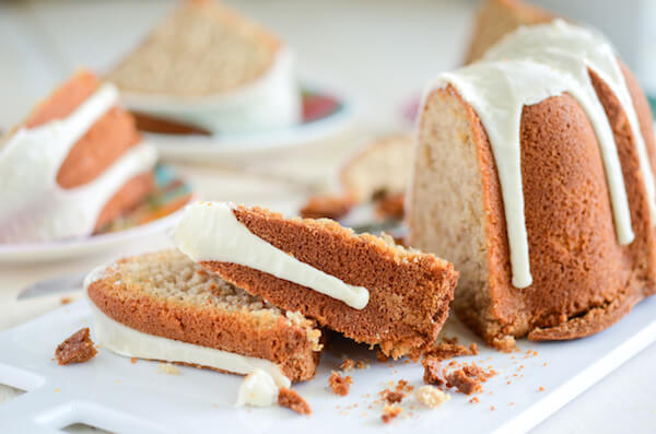 Sliced Spiced Buttermilk Pound Cake on white cutting board