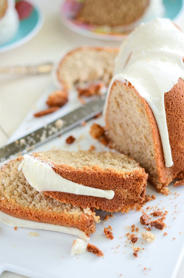 Sliced Sliced Spiced Buttermilk Pound Cake on white cutting board