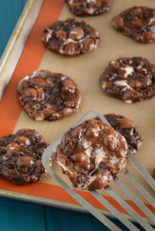 Flourless Chocolate Fudge Marshmallow Cookies on a cookie sheet.