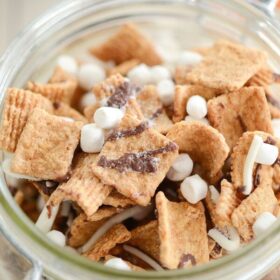 Close up of Smore's Snack Mix in a glass jar