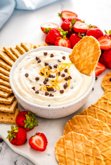 Cannoli dip with chocolate chips and wafer cookies.
