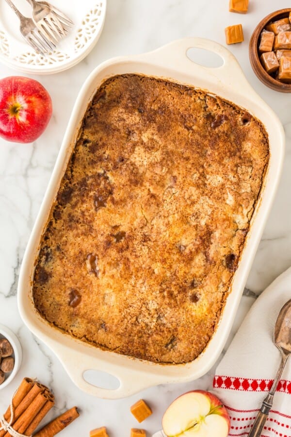 Baked cinnamon apple dump cake in a casserole dish.