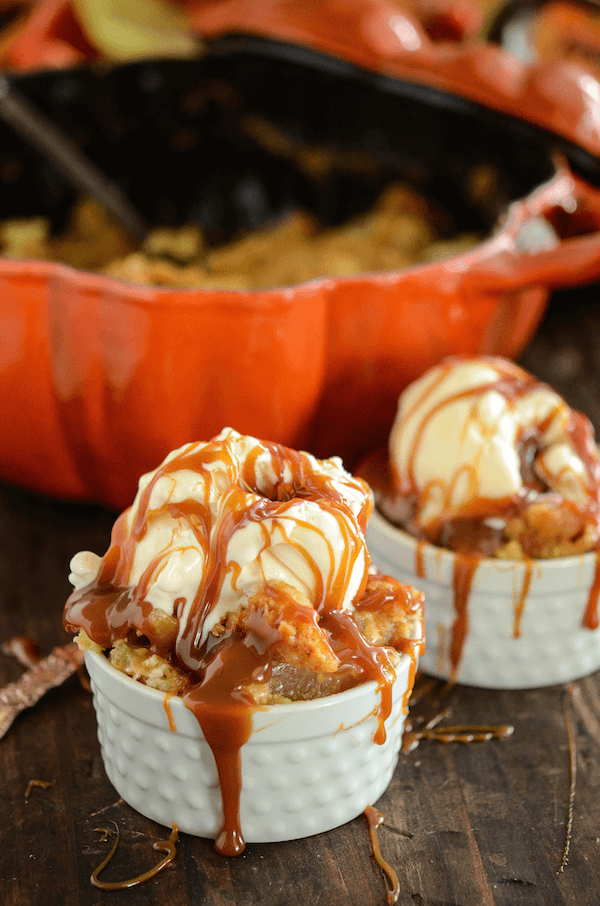Two Caramel Apple Dump Cakes Topped with Vanilla Ice Cream & Caramel Sauce