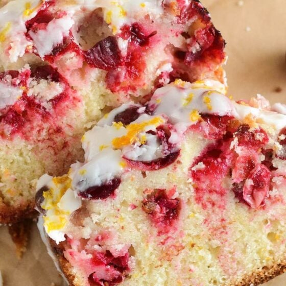 Up close photo of cranberries in cranberry orange quick bread.