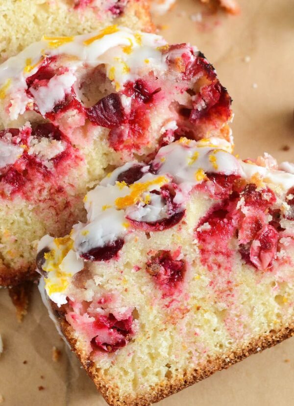 Up close photo of cranberries in cranberry orange quick bread.