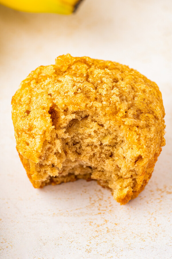 Bitten-into brown sugar banana muffin.