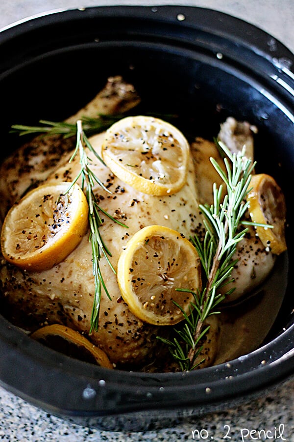 Lemon Garlic Chicken with Sprigs of Rosemary and Lemon Slices