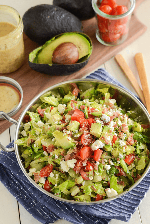 Copycat Maggiano's Chopped Salad Recipe! Crispy pancetta, avocado, tomatoes, blue cheese (or gorgonzola) and a delicious homemade dressing!