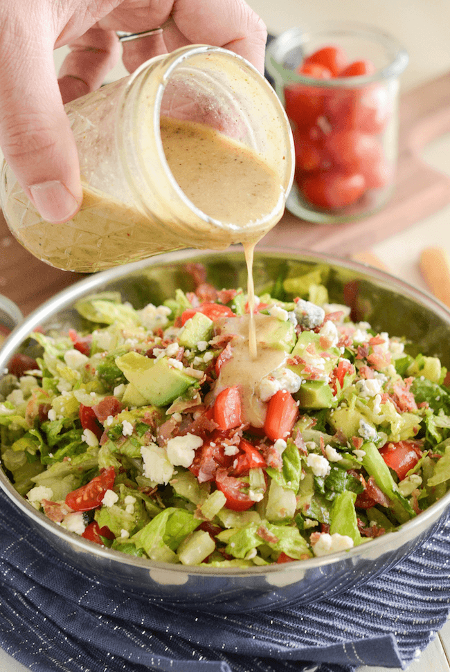 Copycat Maggiano's Chopped Salad Recipe! Crispy pancetta, avocado, tomatoes, blue cheese (or gorgonzola) and a delicious homemade dressing!