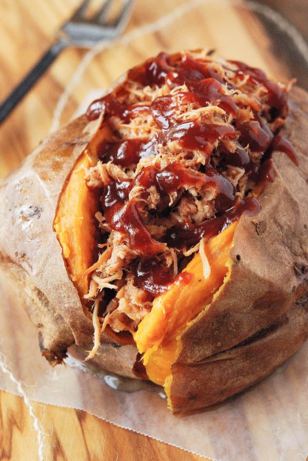 Baked sweet potato stuffed with pulled pork and drizzled with bbq sauce.