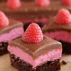 Raspberry Chocolate Bars topped with a fresh raspberry