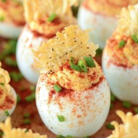 Deviled Eggs with a Parmesan Crisp with a healthy paprika sprinkle