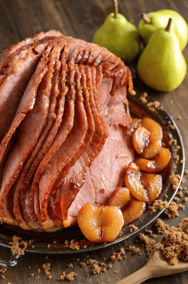 Pear Glazed Ham! It has a perfectly sweet candied outside with soft spiced pears to serve on the side. #Easter