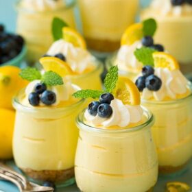Individual Lemon Cheesecake Mousse Cups on a Serving Tray