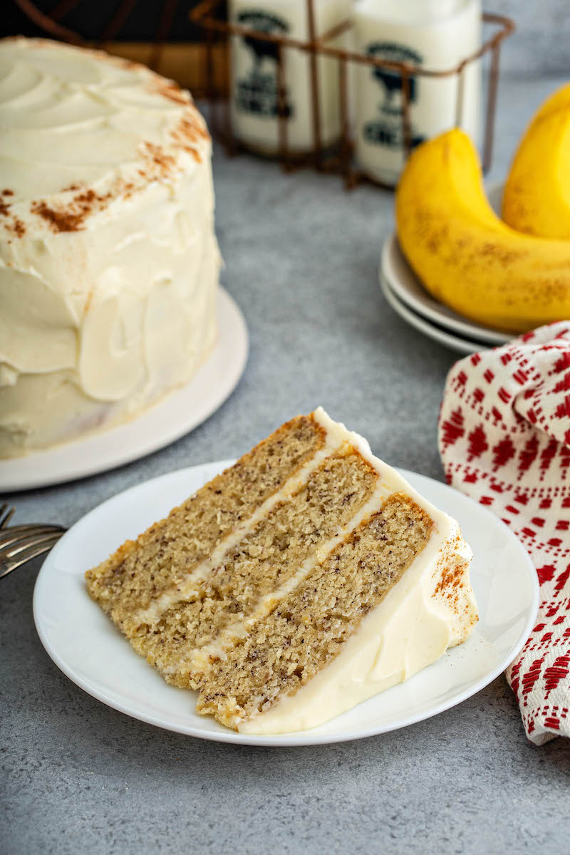 Slice of banana cake on a plate.