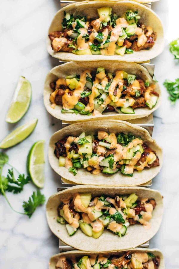 Caramelized Pork Tacos with Pineapple Salsa and Slices of Lime