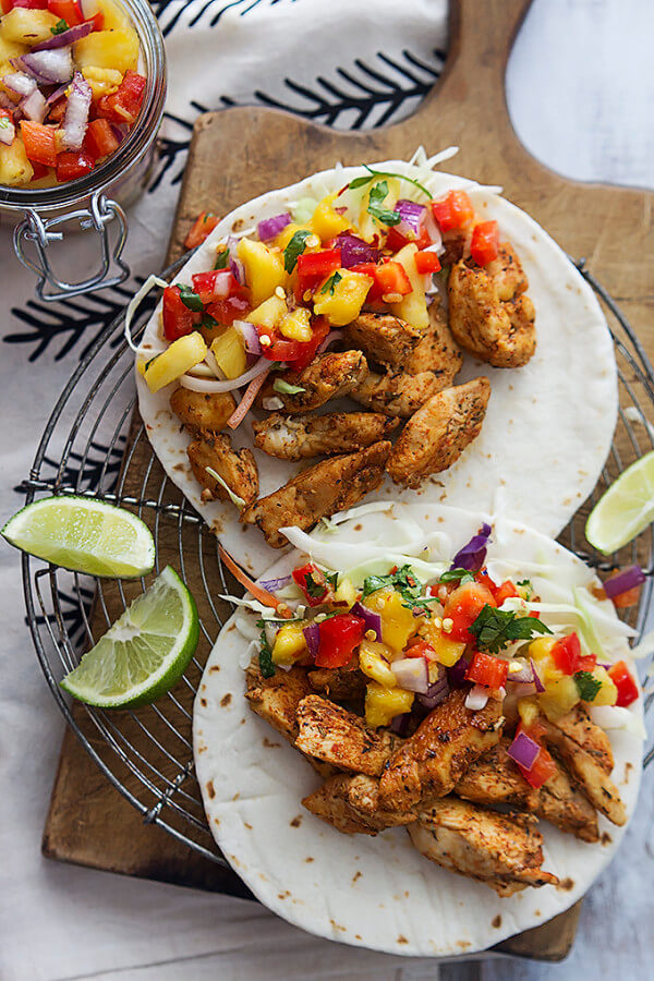 Two Caribbean Chicken Tacos with Lime Slices