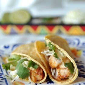Two Blackened Fish Tacos on a Spanish Style Plate