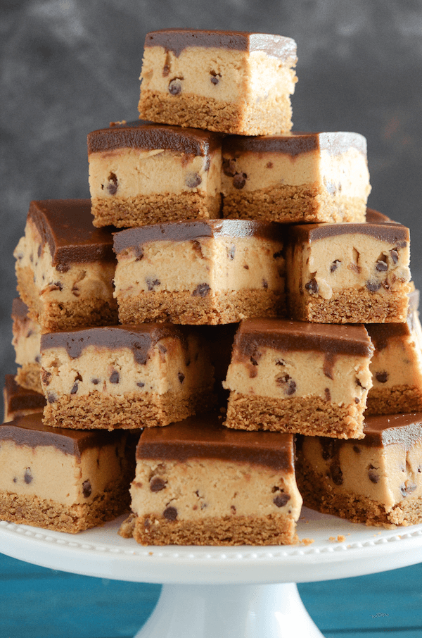 Peanut Butter Cookie Dough Bars - a layer of peanut butter cookie, then a thick layer of cookie dough and topped with chocolate ganache! 