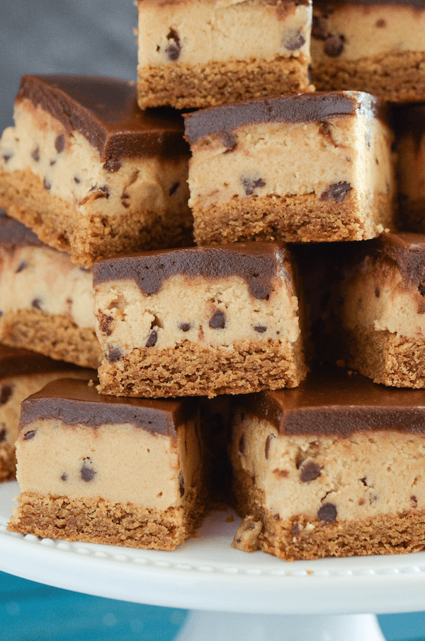 Peanut Butter Cookie Dough Bars - a layer of peanut butter cookie, then a thick layer of cookie dough and topped with chocolate ganache! 
