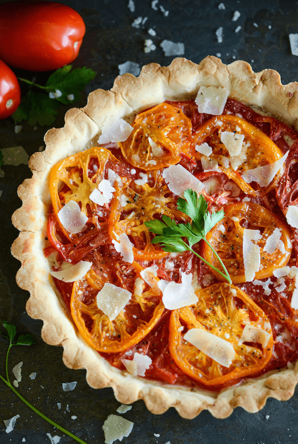 An Heirloom Tomato Tart Topped with Shaved Parmesan