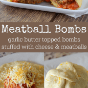 Meatball Bombs cut in half showing meatball with sauce on a white plate.