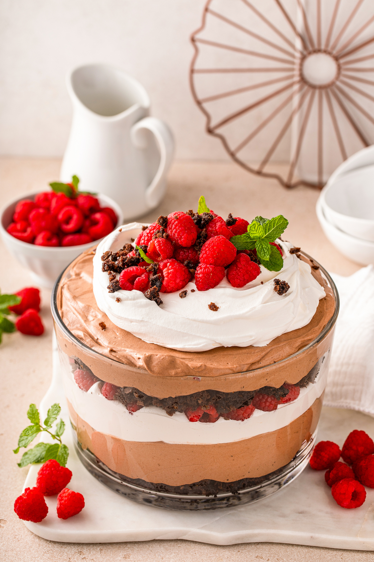 Brownie trifle with chocolate pudding, whipped cream, and raspberries. 