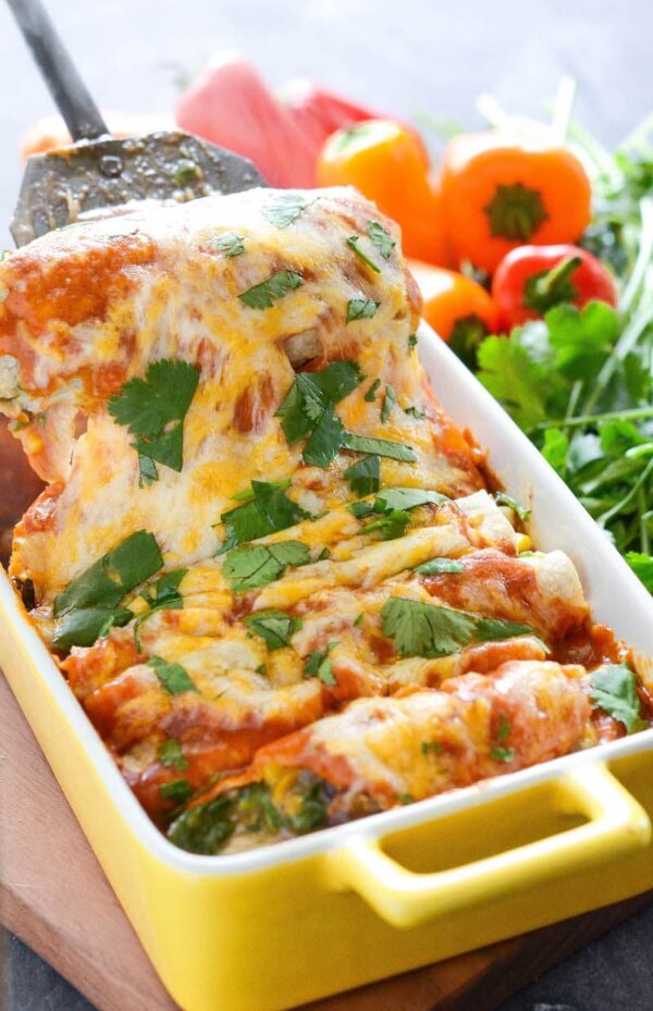 Vegetable Enchiladas: cheesy vegetarian enchiladas are stuffed with tons of vegetables and are wrapped in a flavorful five minute homemade enchilada sauce! #Enchiladas #VegetableEnchiladas #VegetarianEnchiladas #Vegetables #Vegetarian #Recipe