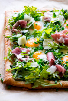 An Asparagus Egg Prosciutto Tart Topped with a Summer Salad