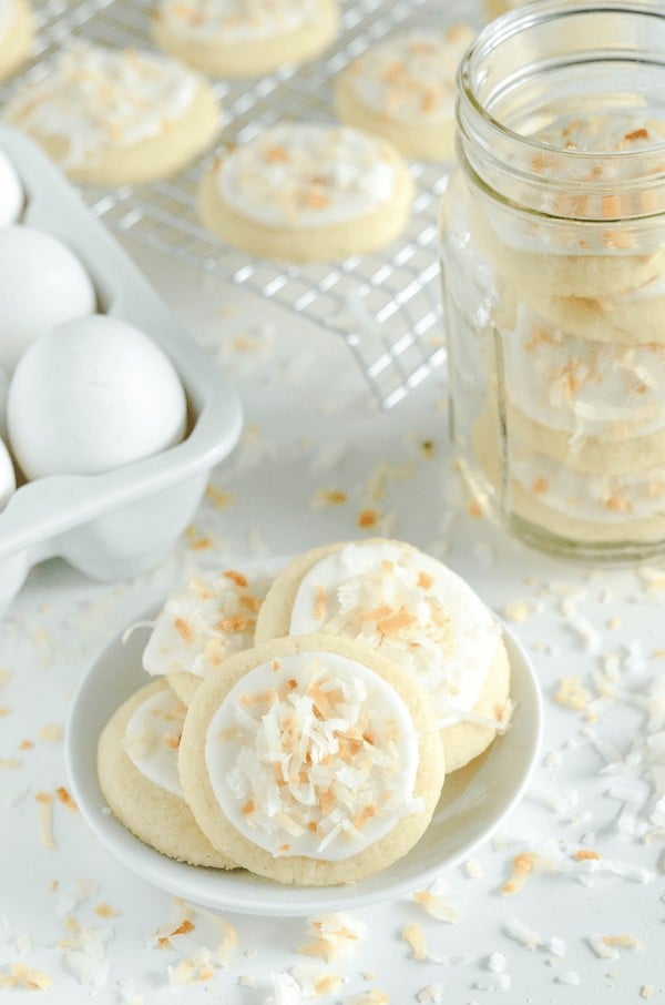 Coconut Meltaway Cookies - a soft coconut shortbread cookie topped with royal icing and toasted coconut! 
