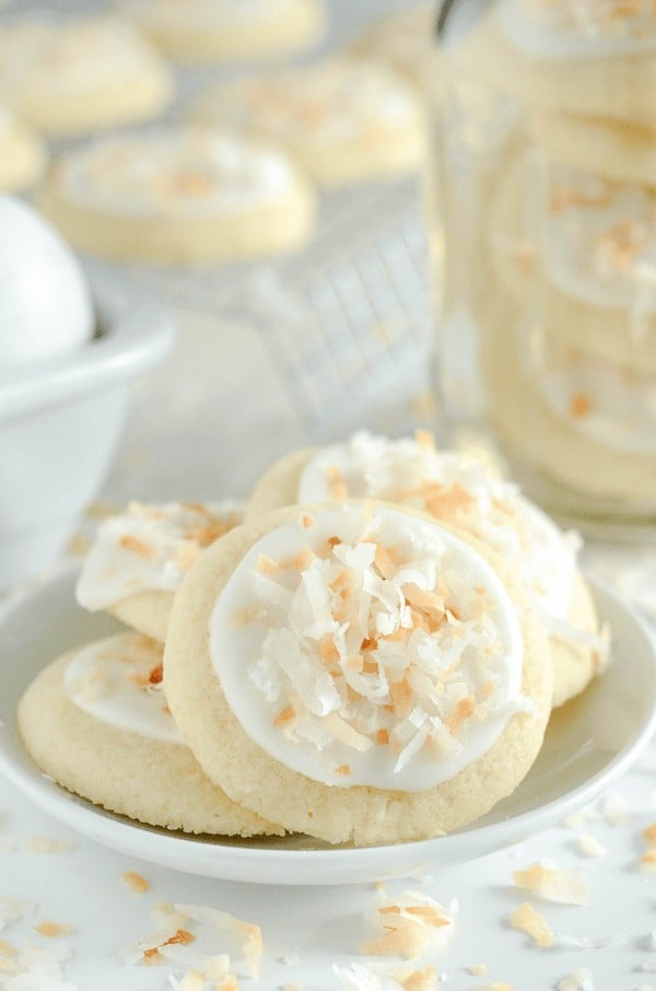 Coconut Meltaway Cookies - a soft coconut shortbread cookie topped with royal icing and toasted coconut! 