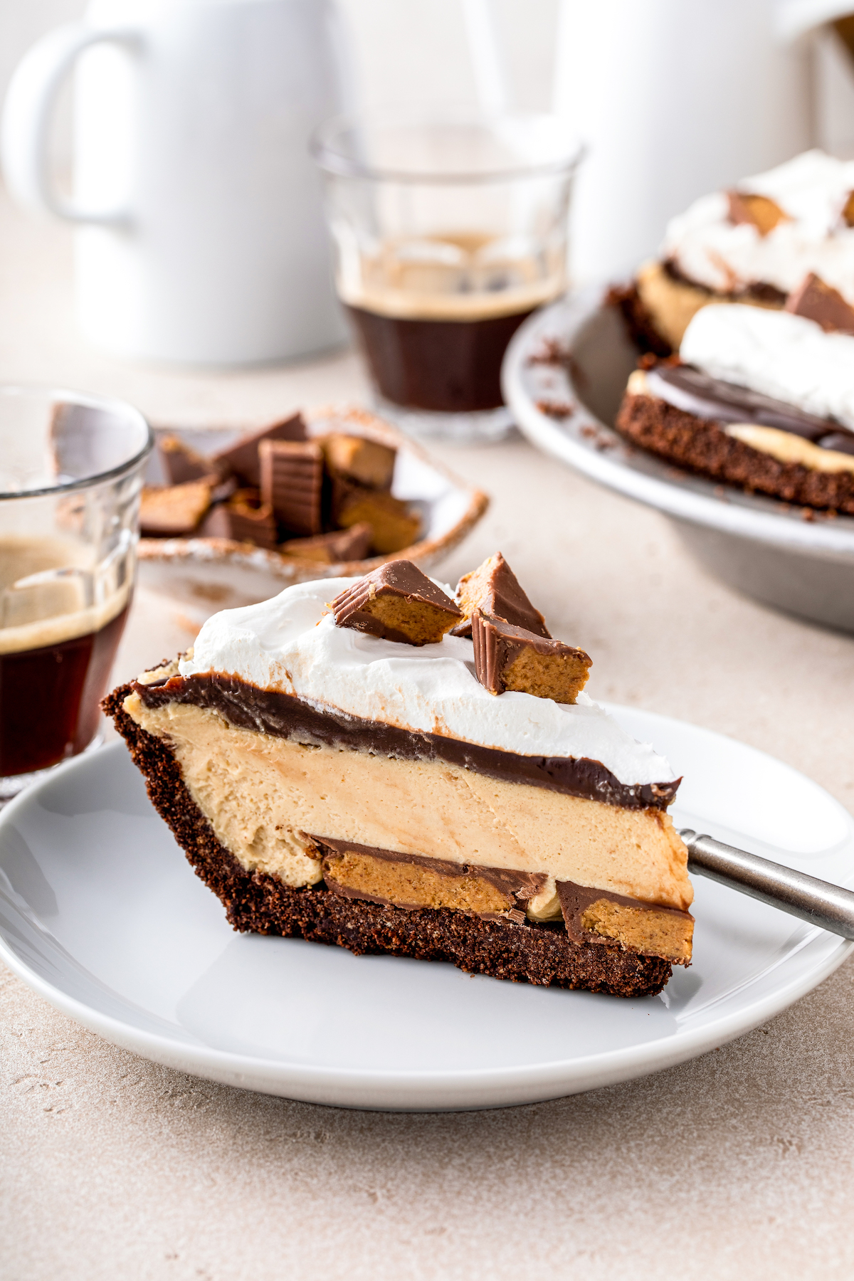 A slice of Reese's peanut butter pie on a plate.