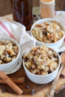 Rum Raisin Baked Rice Pudding in white bowls.