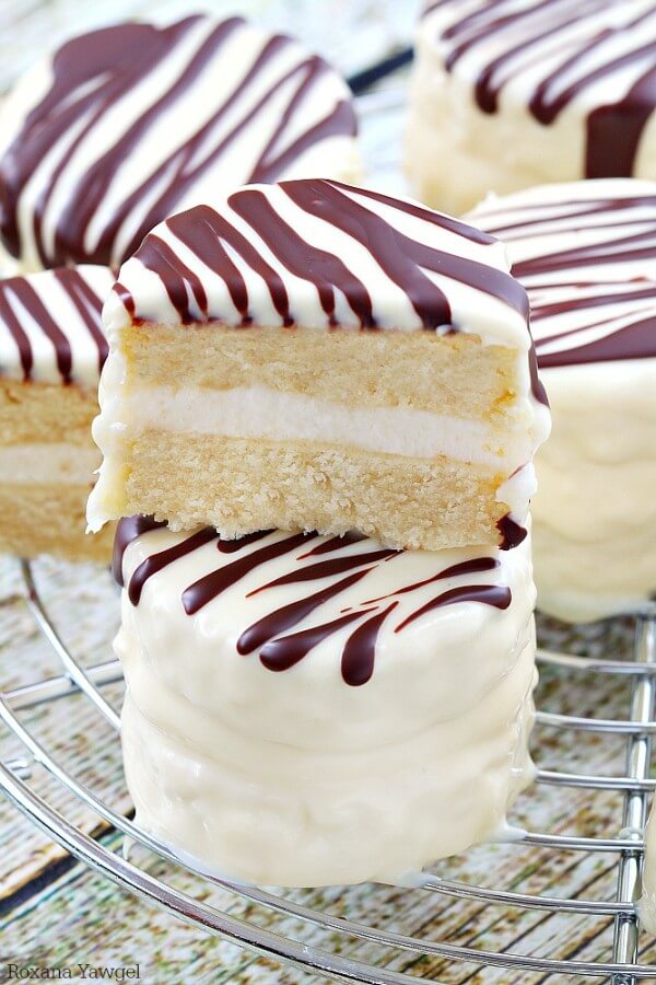 Two Copycat Zebra Cakes Stacked on a Cooling Rack