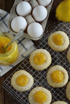 Lemon Curd Shortbread Cookies Dusted with Powdered Sugar on a Wire Rack