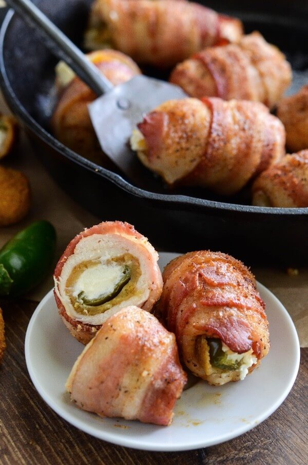 Bacon Wrapped Jalapeno Popper Stuffed Chicken Rollups on a Plate