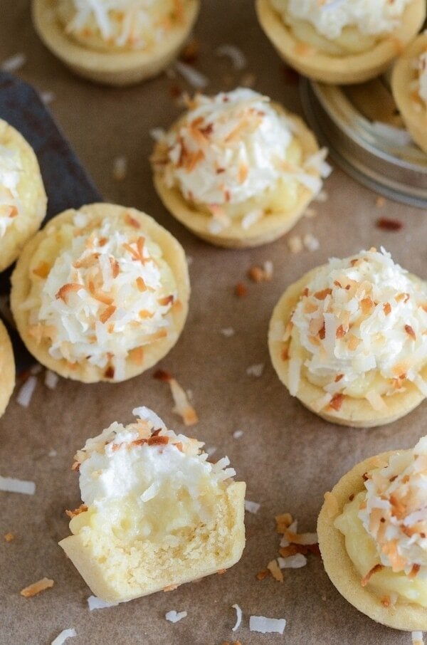 Coconut Cream Pie Cookie Cups - the perfect bite size combination of two classic desserts — coconut cream pie and sugar cookies!