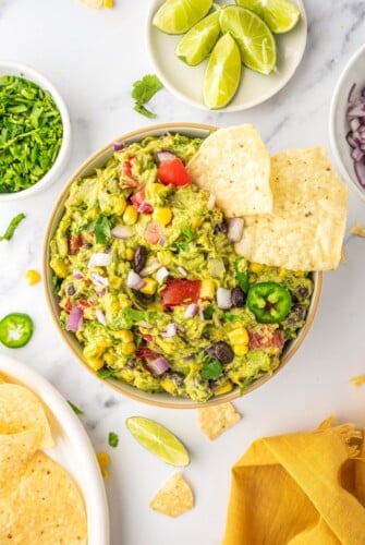 Loaded guacamoled with corn chips.
