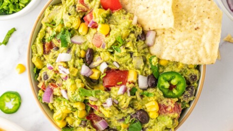 Loaded guacamoled with corn chips.