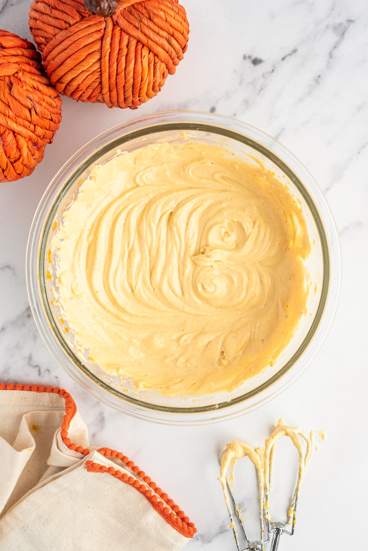 Whipped cinnamon pumpkin cream cheese dip in a bowl.