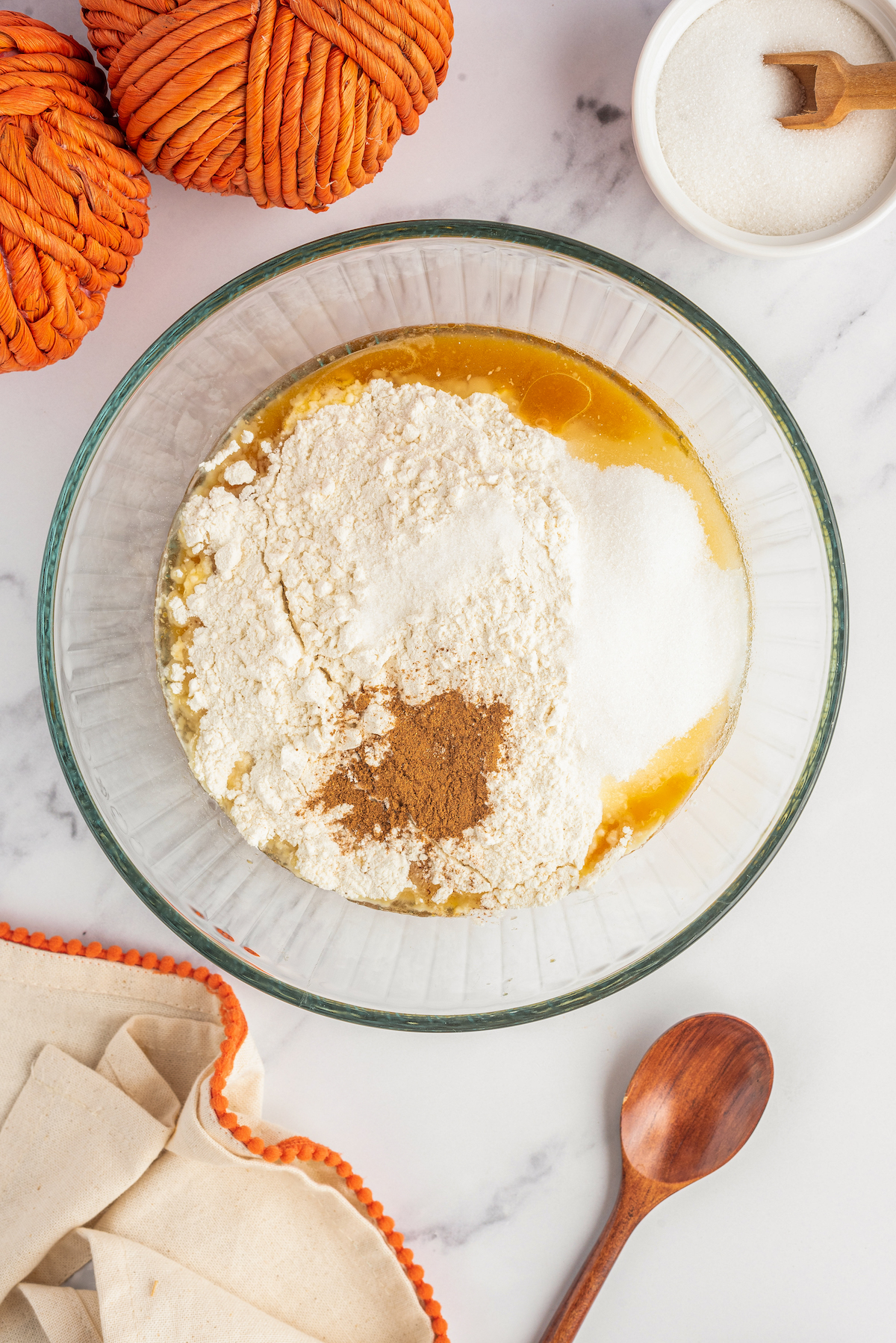 Folding the wet and dry ingredients together for pumpkin churros.