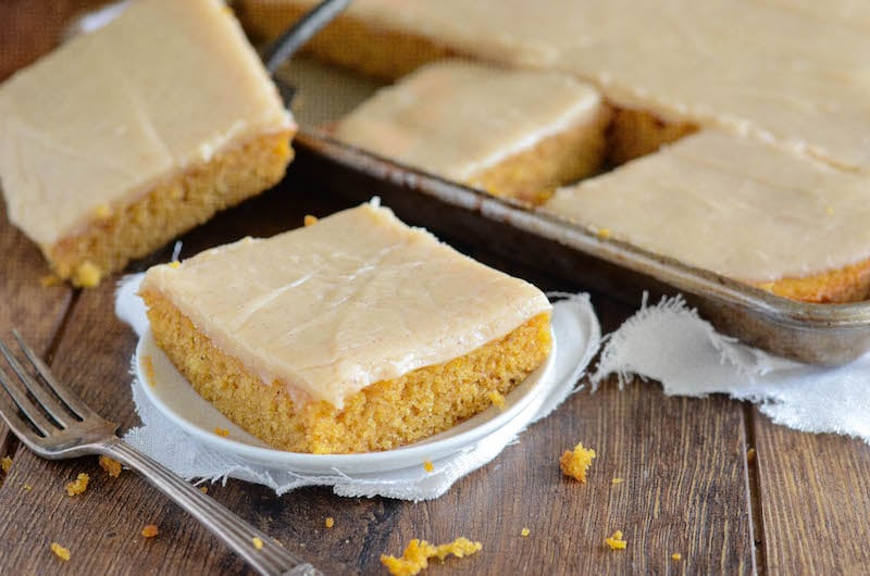 Homemade spiced pumpkin sheet cake on plate. 