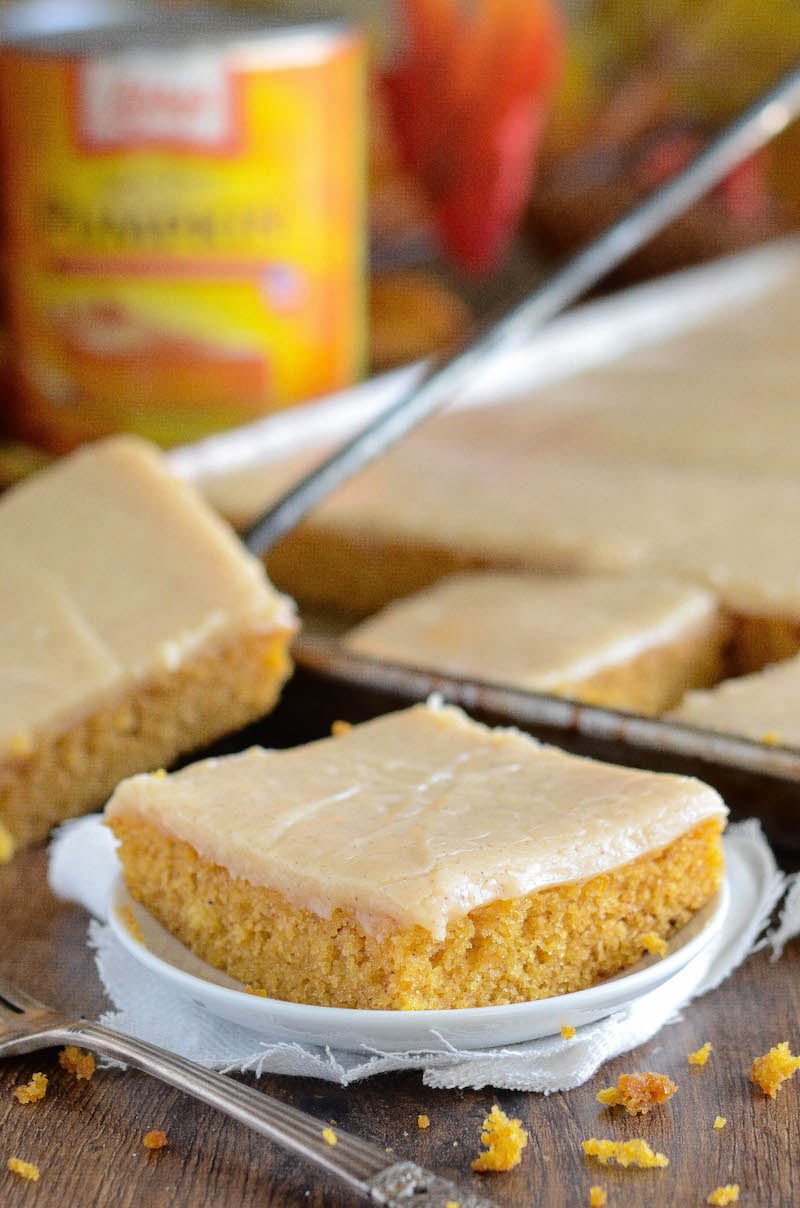 Pumpkin Sheet Cake: this easy homemade spiced pumpkin sheet cake is made in just 30 minutes and frosted with a creamy cinnamon cream cheese icing!