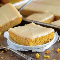 Pumpkin Sheet Cake: this easy homemade spiced pumpkin sheet cake is made in just 30 minutes and frosted with a creamy cinnamon cream cheese icing! #pumpkin #cake #fallrecipes #pumpkindessert