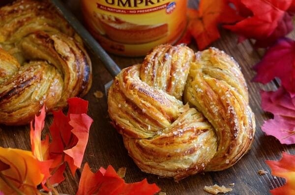 Pumpkin Twists: Flaky puff pastry is stuffed with spiced pumpkin and topped with a vanilla glaze! #pumpkin #dessert