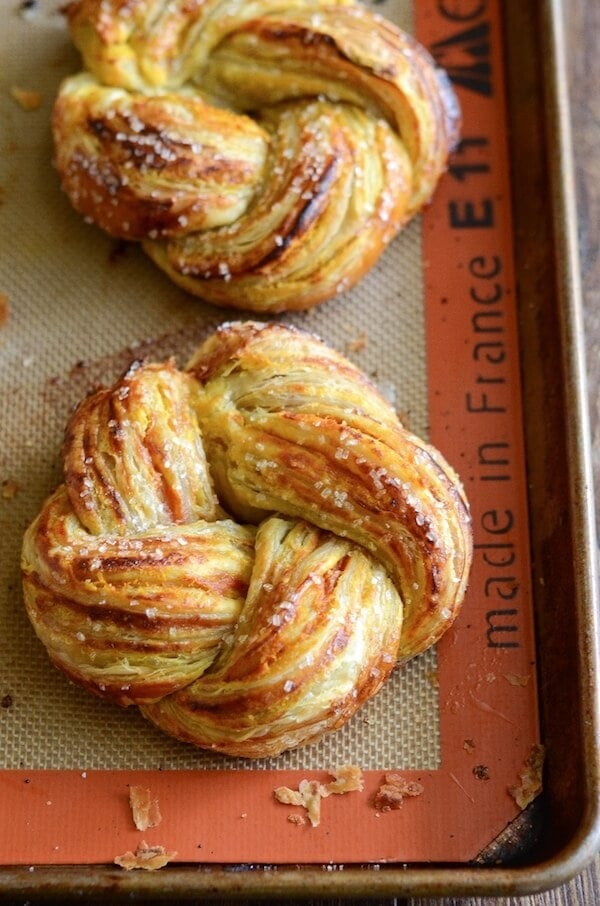 Pumpkin Twists: Flaky puff pastry is stuffed with spiced pumpkin and topped with a vanilla glaze!
