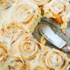 Pumpkin Cinnamon Rolls made in just 30 minutes! Sweet pumpkin cinnamon rolls are made quickly with crescent dough and then covered in a delicious cream cheese frosting!