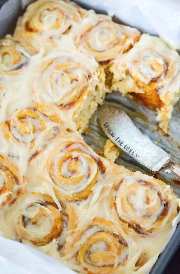 Pumpkin Cinnamon Rolls made in just 30 minutes! Sweet pumpkin cinnamon rolls are made quickly with crescent dough and then covered in a delicious cream cheese frosting!