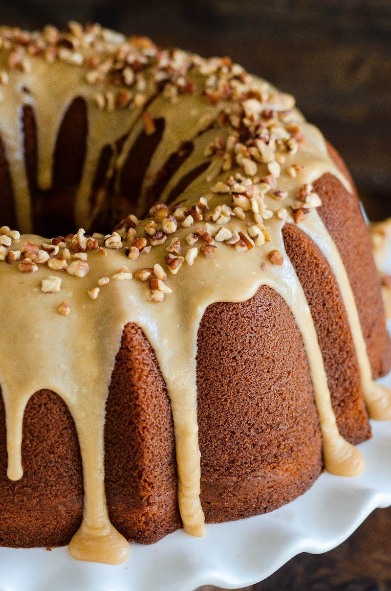 Sweet potato cream cheese bundt cake topped with praline frosting.
